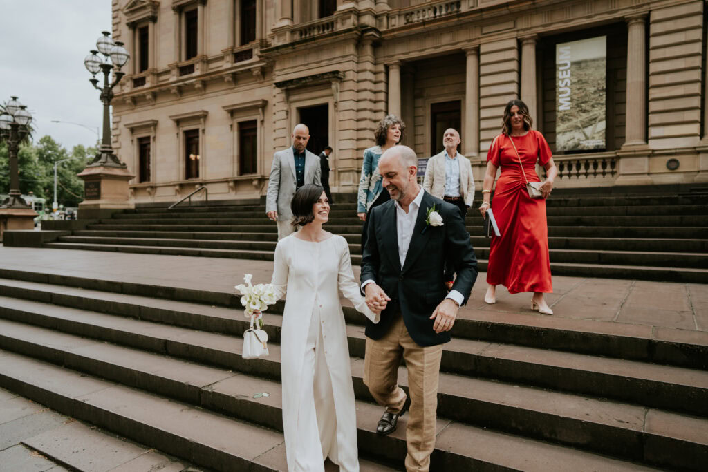 Steph and Marcus leave their Melbourne Registry Office wedding